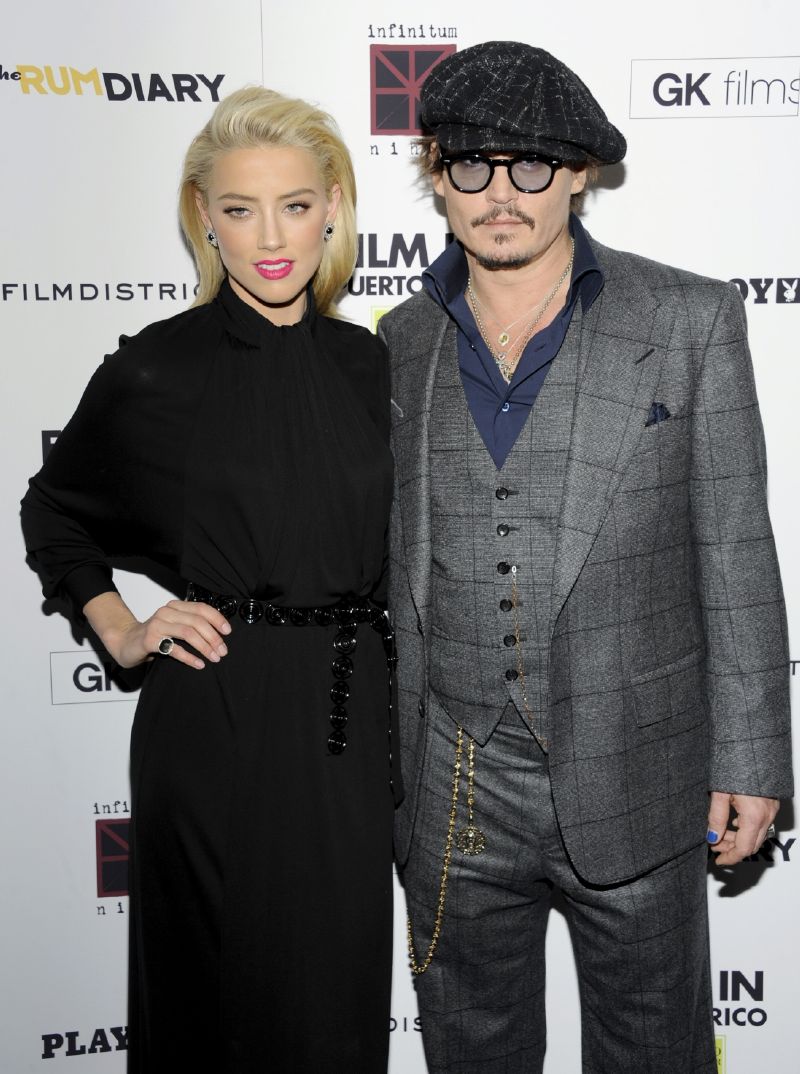 Johnny Depp a Amber Heardová na premiéře filmu Rumový deník, během jehož natáčení se v roce 2010 sblížili 