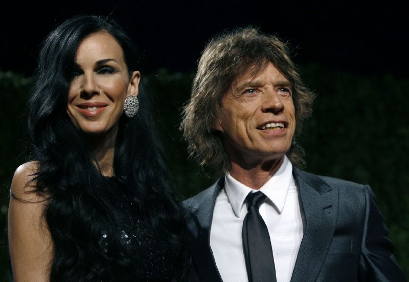 Mick Jagger a L'Wren Scottová na party časopisu Vanity Fair v únoru 2011.