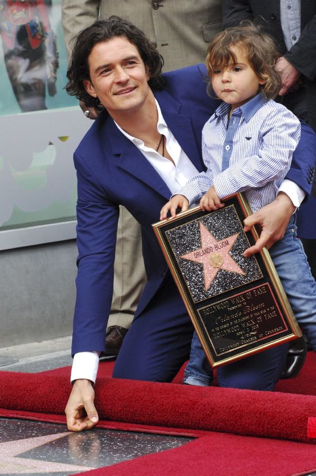 Na hollywoodský chodník slávy vzal Orlando Bloom i svého tříletého syna.