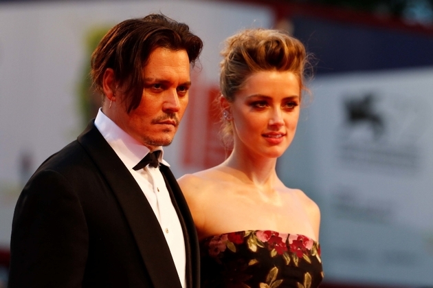 Zdroj britského deníku The Sun tvrdí, že měla herečka za Johnnyho zády poměr se ženou.
