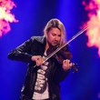 Houslový virtuóz David Garrett čelí skandálu, žaluje ho bývalá přítelkyně prostitutka.